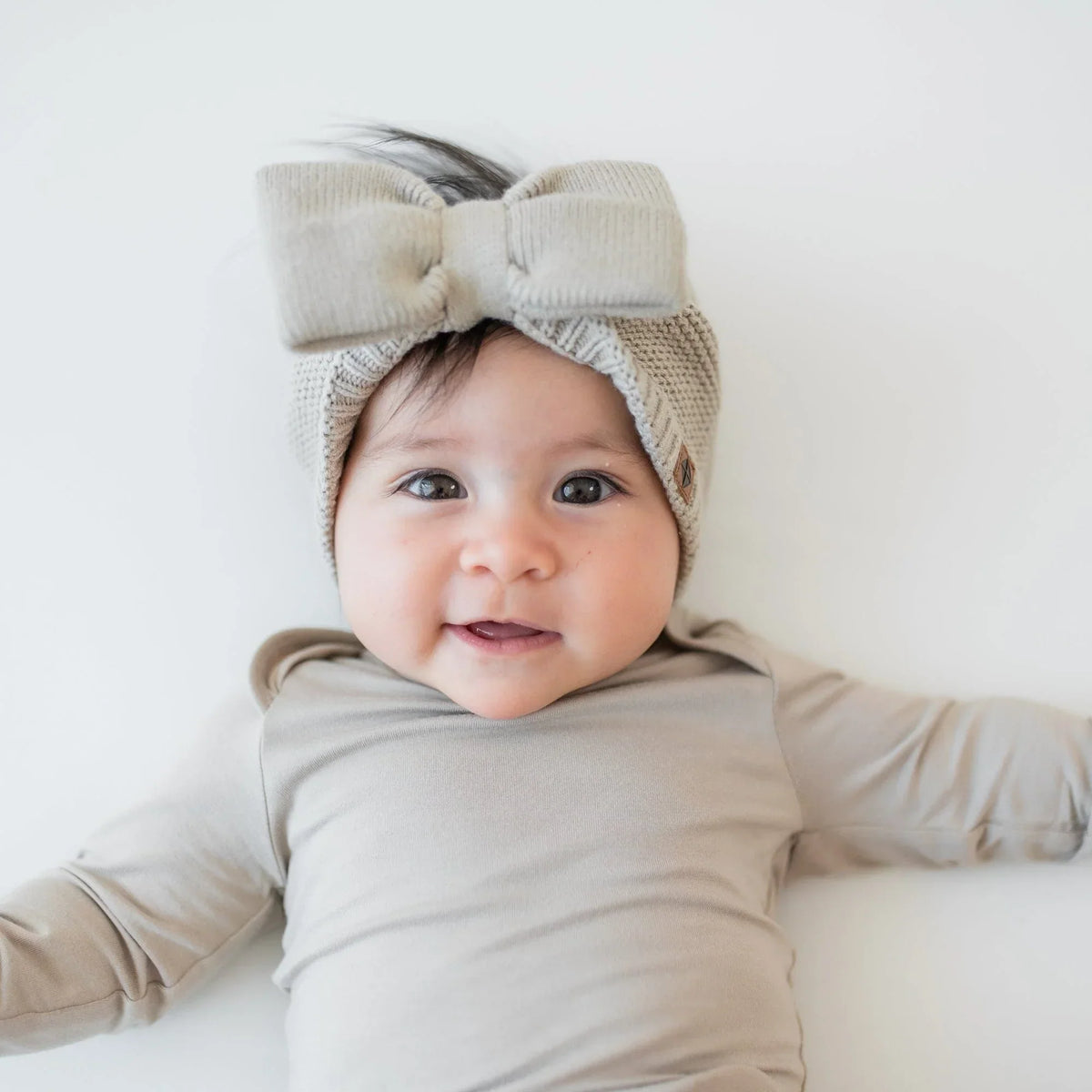 Chunky Knit Bow Headband in Almond